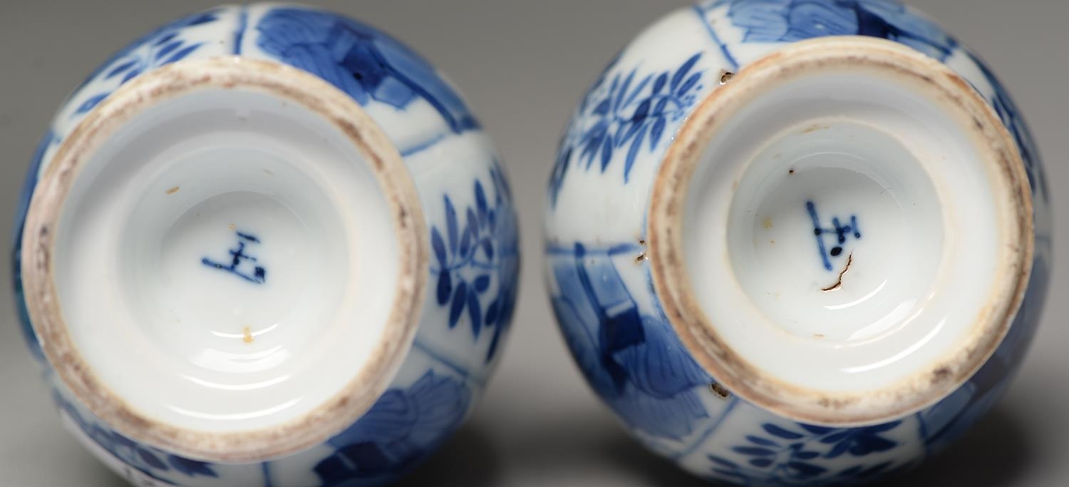 Two Chinese moulded blue and white vases, 18th c, painted with a seated woman alternating with - Image 2 of 2