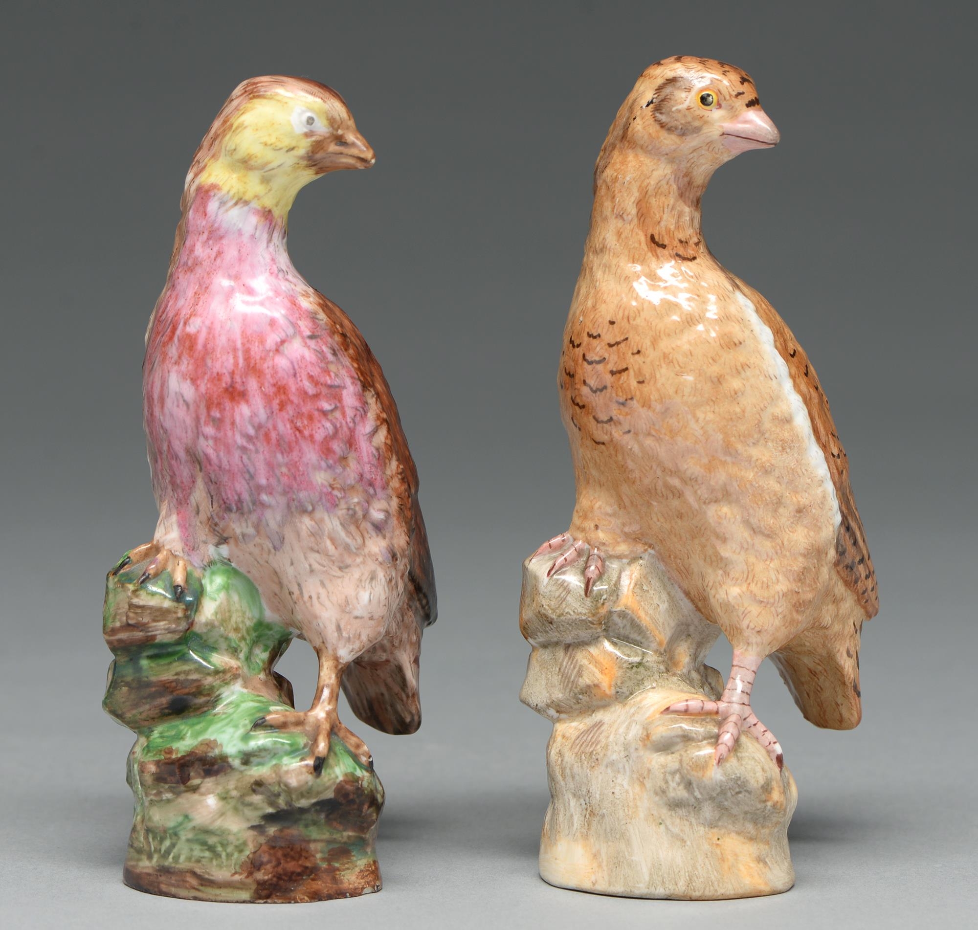 A pair of Berlin porcelain models of quail, late 19th c, on rocks and rustic stump, 15cm h,