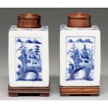 A pair of Chinese blue and white tea caddies, 19th c or later, of square section, each side