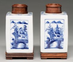 A pair of Chinese blue and white tea caddies, 19th c or later, of square section, each side
