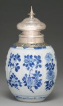 A Chinese blue and white jar, 18th c, lobed oviform and painted with flowering plants, silver mount,