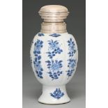A Chinese blue and white vase, 18th c, lobed ovoid on flared foot, painted with flowering plants,