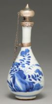 A Chinese blue and white vase, 19th c, painted with flowers sprouting from rocks, later silver