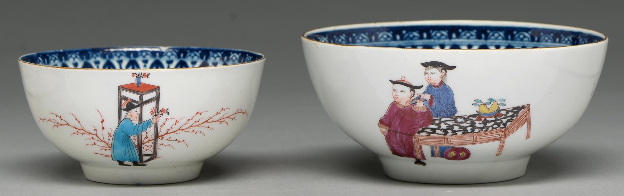 A Worcester sugar bowl and slop basin, c1765, with underglaze blue border and painted with three