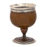An unusually large silver mounted coconut cup, possibly English,  18th c, the pale brown bowl of