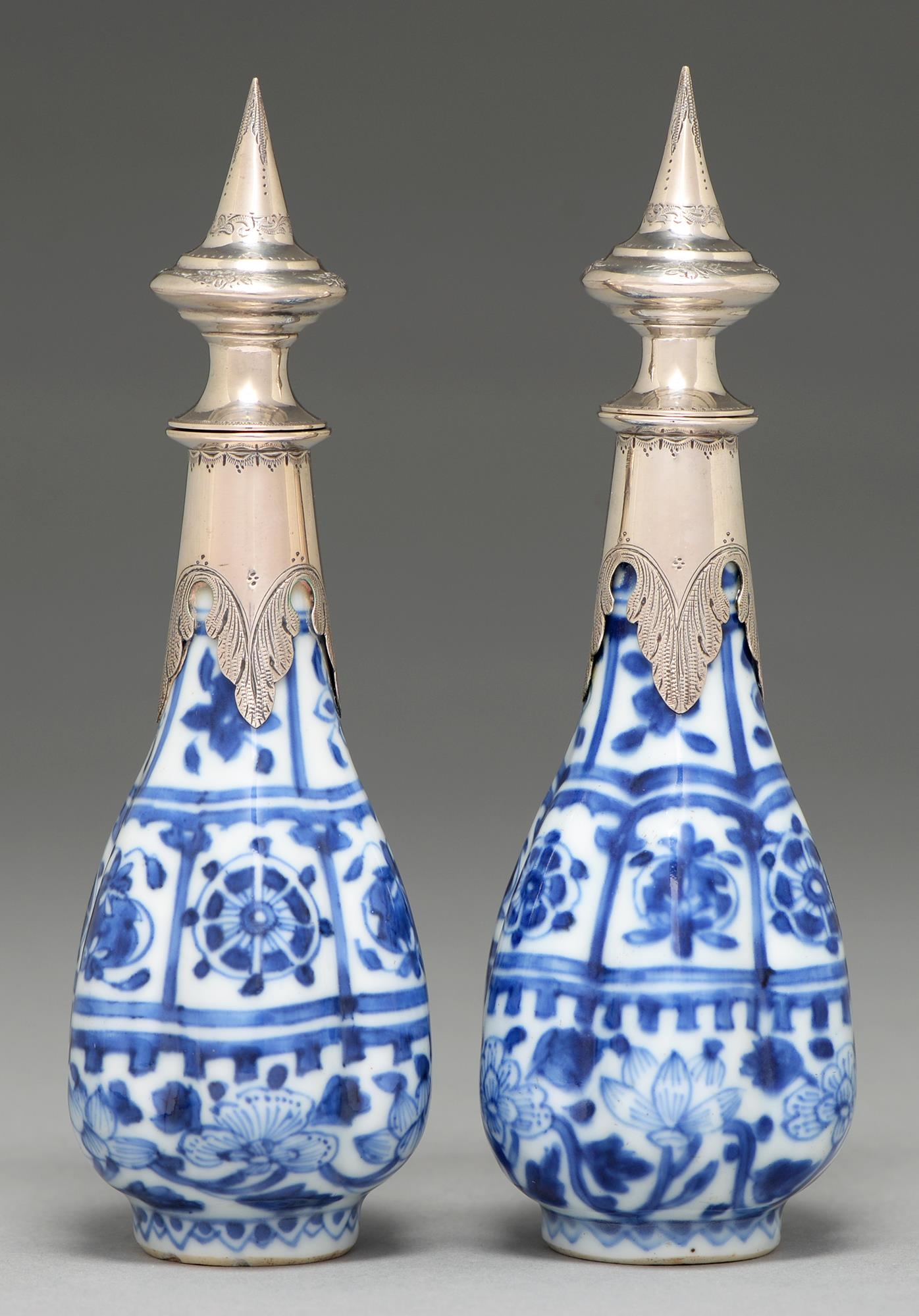 Two Chinese blue and white bottles, 18th c, of lobed form and painted with stylised flowers and
