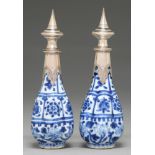 Two Chinese blue and white bottles, 18th c, of lobed form and painted with stylised flowers and