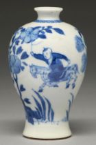 A Chinese blue and white vase, meiping, 19th c, painted with a landscape with two boys, one on