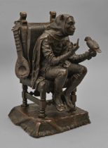 A bronze sculpture of a jester training a bird, cast from a model by F Rosse, late 19th c, dark