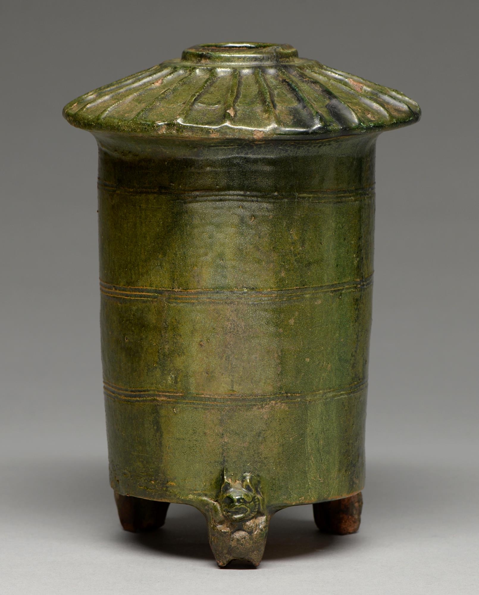 A Chinese green glazed red earthenware model of a granary, Eastern Han Dynasty, 24cm h   Provenance: