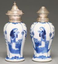 Two Chinese blue and white baluster vases, 18th c, painted with a woman alternating with prunus in