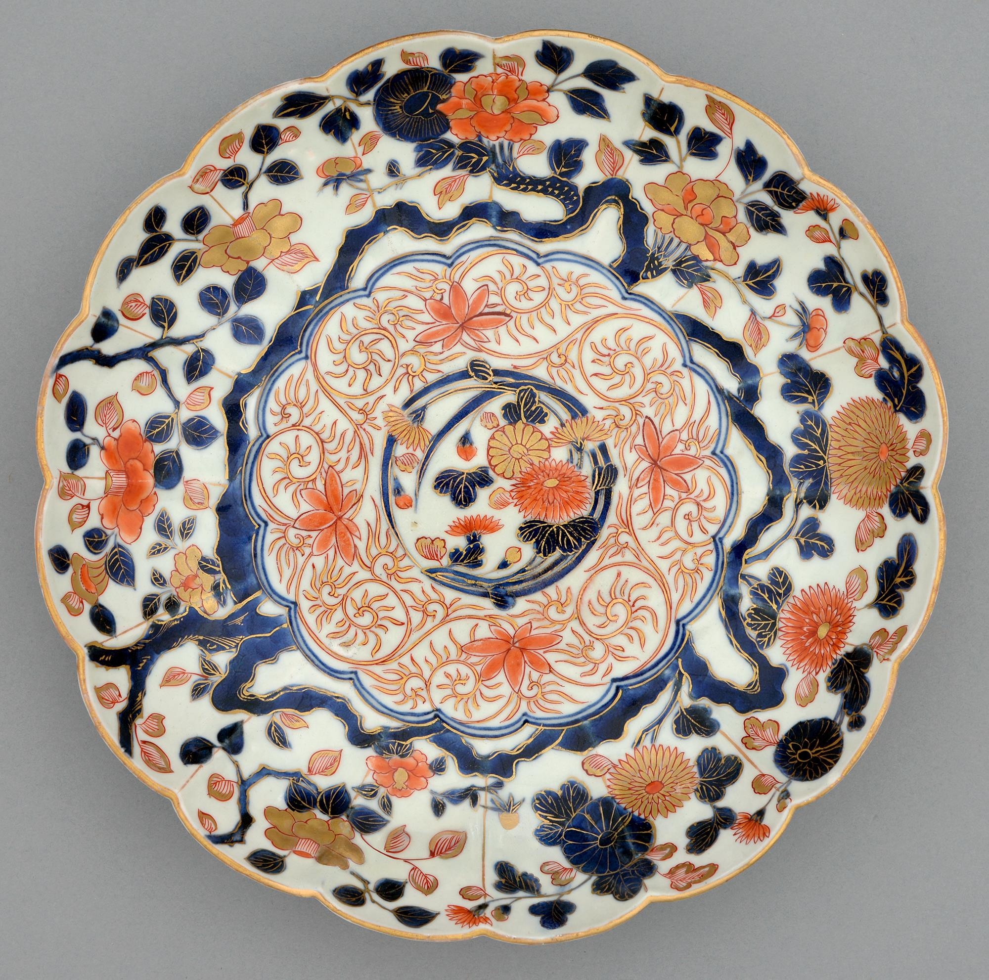 An Imari fluted dish, Edo period, 18th c, painted in underglaze blue and enamelled in red and gilt