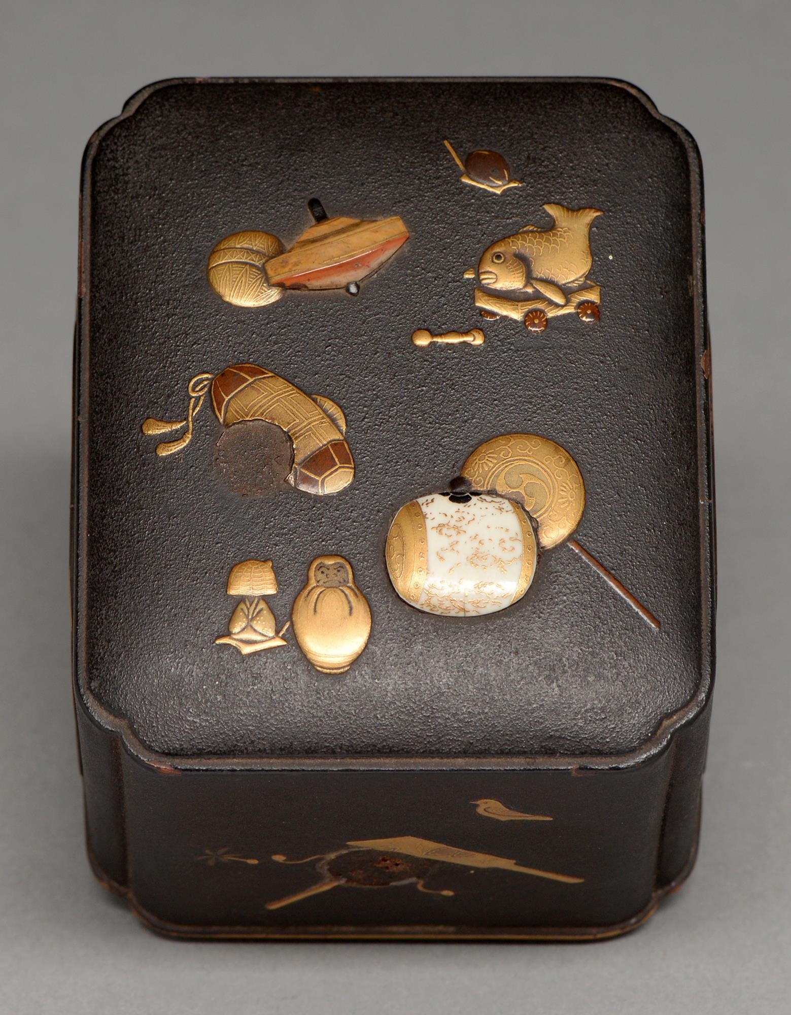 A Japanese shibayama box and cover, Meiji period, decorated in ivory and gold and enamel lacquer