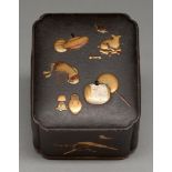 A Japanese shibayama box and cover, Meiji period, decorated in ivory and gold and enamel lacquer