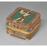 A Japanese cloisonne enamel trinket box, c1930, the lid enamelled with Horus on a green ground,