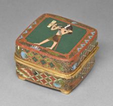A Japanese cloisonne enamel trinket box, c1930, the lid enamelled with Horus on a green ground,