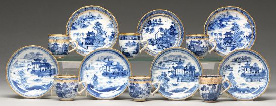 Thirteen pieces of Chinese blue and white export porcelain teaware with European gilt decoration,