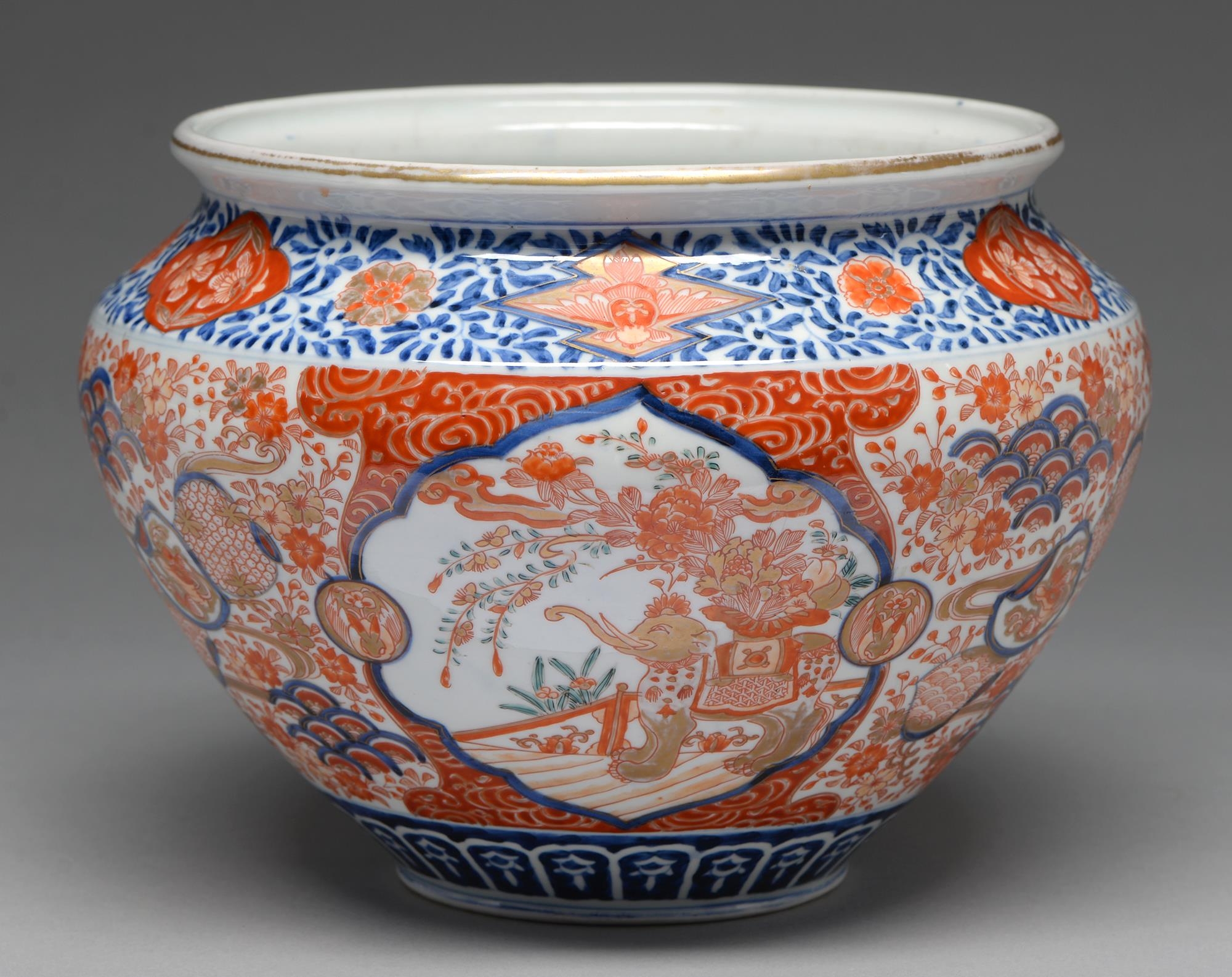 An Imari jardiniere, early 20th c, painted in underglaze blue and enamelled in red and gilt with a
