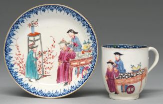 A Worcester coffee cup and saucer, c1765, with underglaze blue border and painted in overglaze