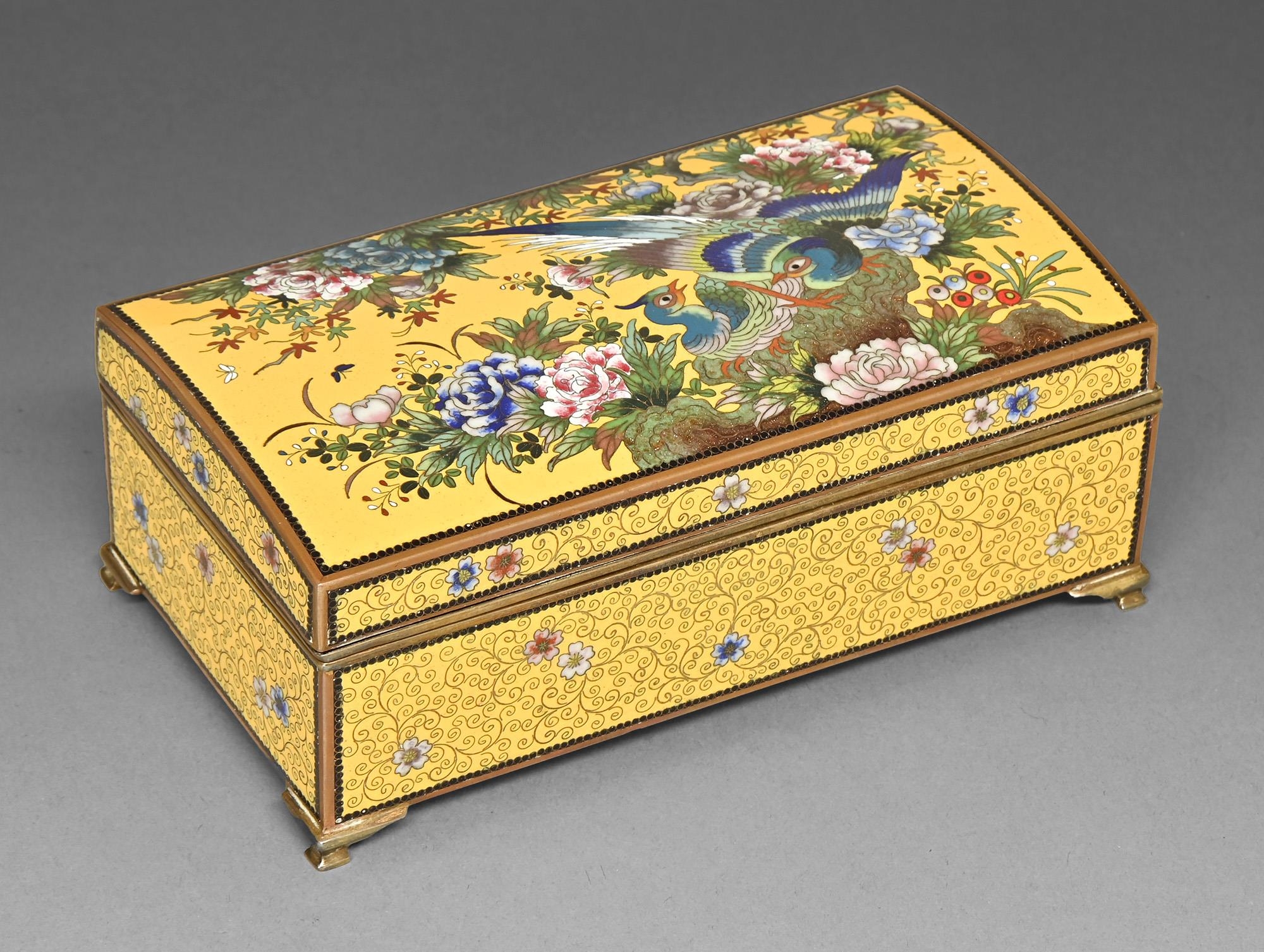 A Japanese cloisonne enamel cigarette box, early 20th c, the slightly domed lid enamelled with birds