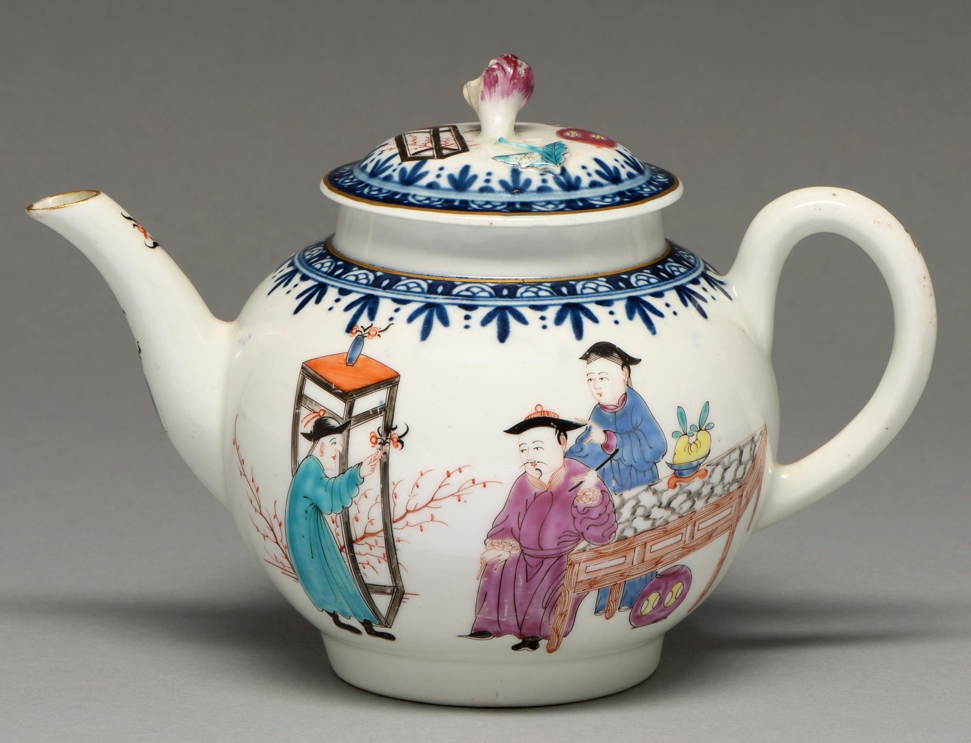 A Worcester teapot and cover, c1765, with underglaze blue border and teapot painted to either side