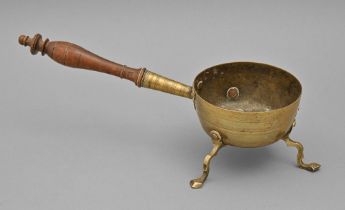 A brass chafing dish, early 19th c, with reeded bands, on three legs, turned wood handle, 29cm l