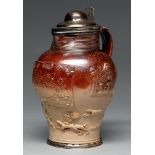 A silver mounted Mortlake saltglazed brown stoneware hunting jug, c1790, the sprigged decoration