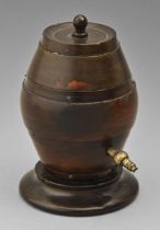 Treen. A Victorian lignum vitae string box in the form of a barrel, with brass nozzle, on weighted