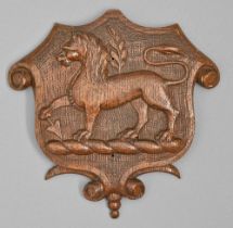 A Victorian heraldic oak applique, the cartouche with lion and dart, 18cm h Tiny chip on lion's mane