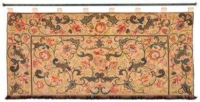 A silk, wool and metal thread embroidered altar frontal or hanging, early 18th c, worked with parrot