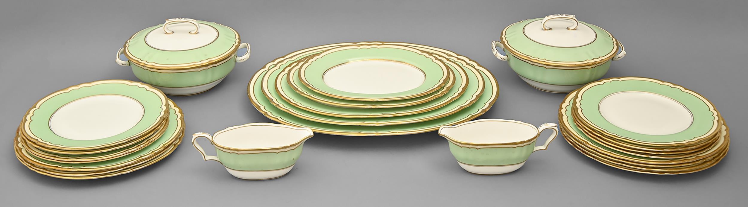 A Crown Staffordshire bone china apple green and gilt bordered dinner service, printed mark Good