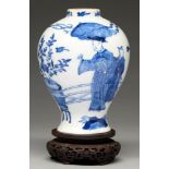 A Chinese blue and white baluster vase, 19th c or later, painted with a man and woman and attendants