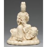 A Chinese blanc de chine figure of Guanyin on an elephant, 20th c, 32cm h The figure's fingers