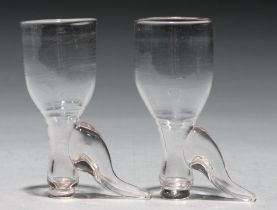 Two English glass boot novelty stirrup cups, c1770, 95mm h Undamaged