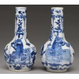 A pair of Chinese blue and white vases, possibly 19th / 20th c, of mallet shape, painted with a