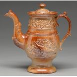 A Derbyshire saltglazed brown stoneware teapot and a cover, probably Chesterfield, mid 19th c,