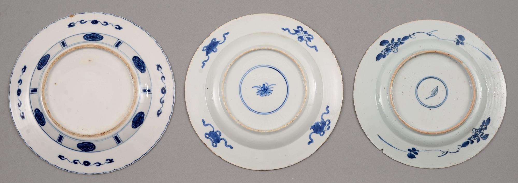 Three Chinese blue and white plates, Kangxi period, painted with a lady and jumping boy or other - Image 2 of 2