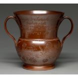 A Derbyshire saltglazed brown stoneware jug, probably Chesterfield, dated 1831, incised on the