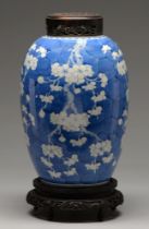 A Chinese blue and white jar, late 19th / early 20th c, painted with prunus on a cracked ice ground,