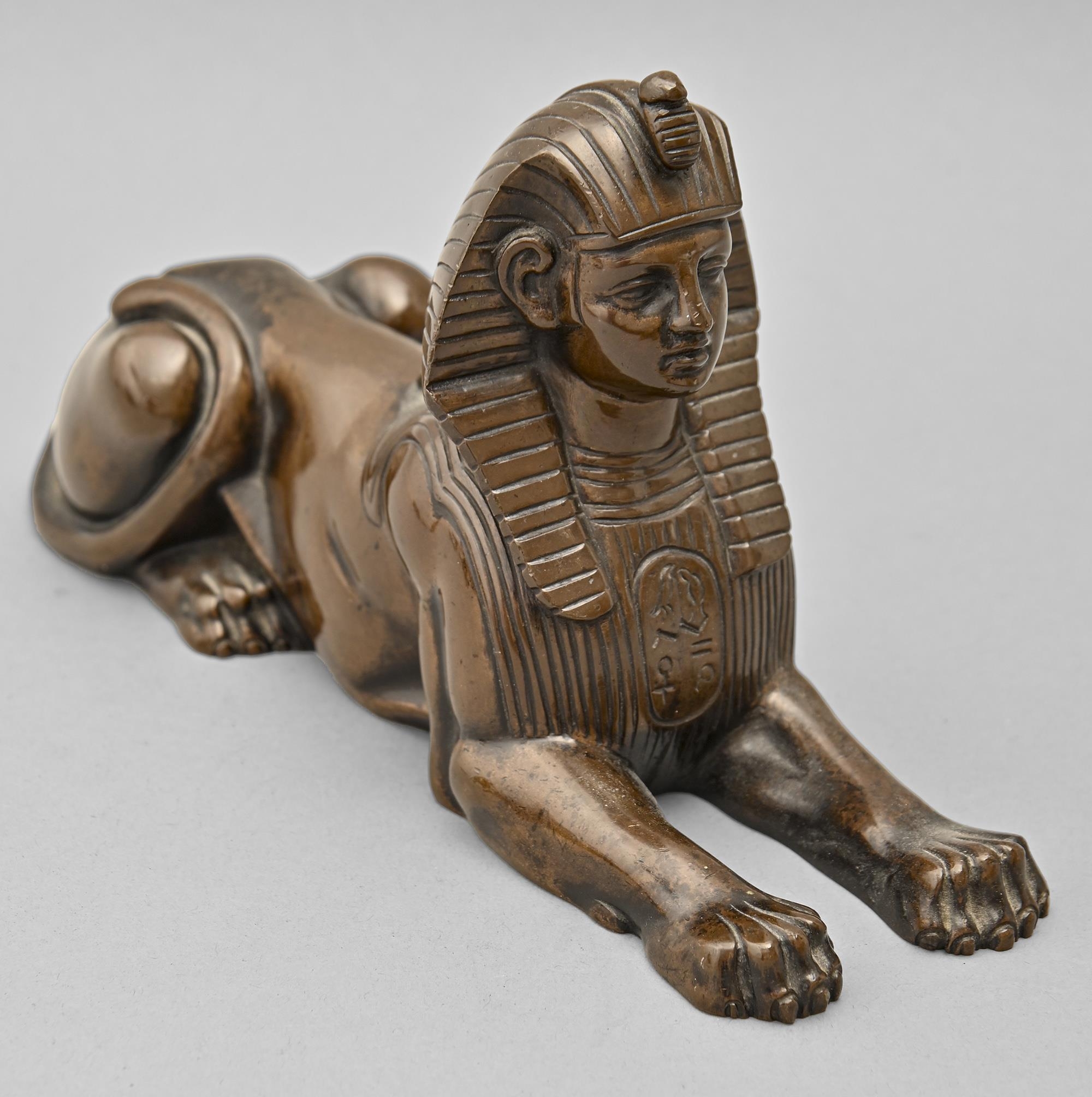 A French bronze sculpture of the Sphinx, late 19th c, uneven light brown patina dark in places, 25cm