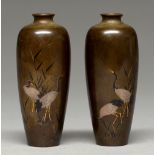 A pair of Japanese inlaid bronze vases, Meiji period, with cranes and bamboo, 11.5cm h, unsigned One