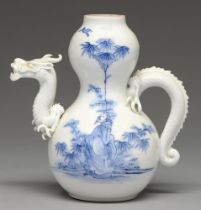An Hirado double gourd ewer, 20th c, with dragon spout and handle, painted in underglaze blue with a
