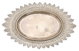 An Ottoman silver tray or stand, 19th / early 20th c, the oval well surrounded by rays, 23.5cm l,