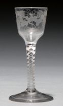A wine glass, c1770, the ogee bowl engraved with bird and grapevines on double series opaque twist