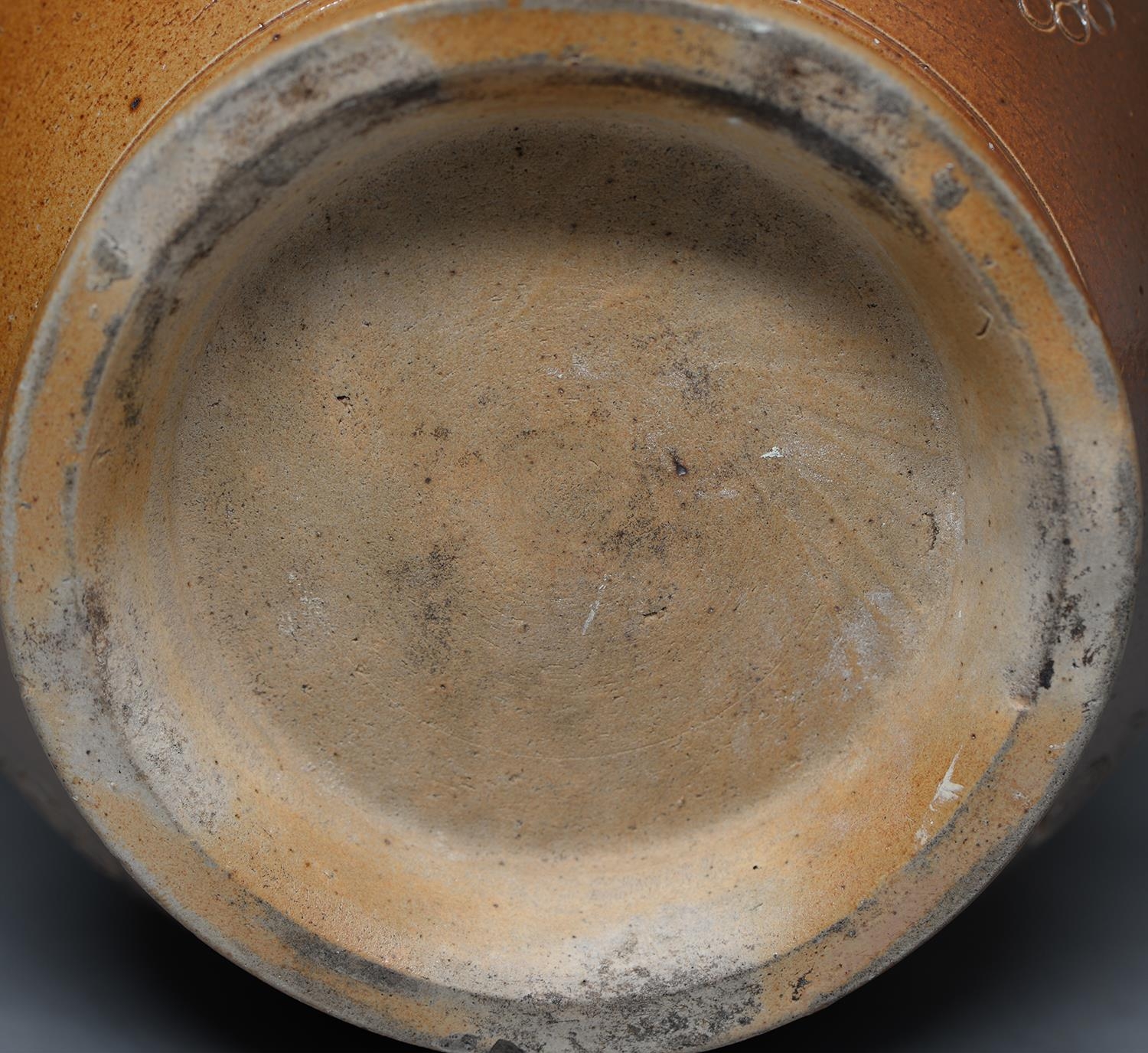 A Derbyshire saltglazed brown stoneware loving cup, Chesterfield, dated 1797, the flared neck - Image 2 of 2