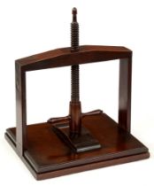 A George III mahogany book press, the frame with two flush brass corner brackets, mahogany helix