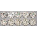 Ten Chinese famille verte plates, six Kangxi period, four later, enamelled with a dignitary on a