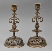 A pair of French bronze candlesticks, late 19th c, on domed openwork foot, brown patina, 18.5cm h