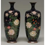 A pair of Japanese cloisonne enamel vases, Meiji period, enamelled with chrysanthemums, peonies