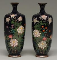 A pair of Japanese cloisonne enamel vases, Meiji period, enamelled with chrysanthemums, peonies